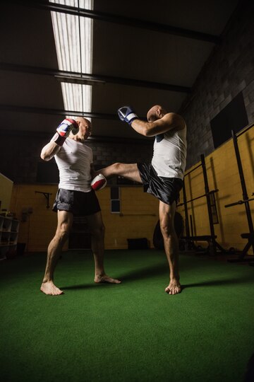two-boxer-practicing-boxing-fitness-studio_107420-65151
